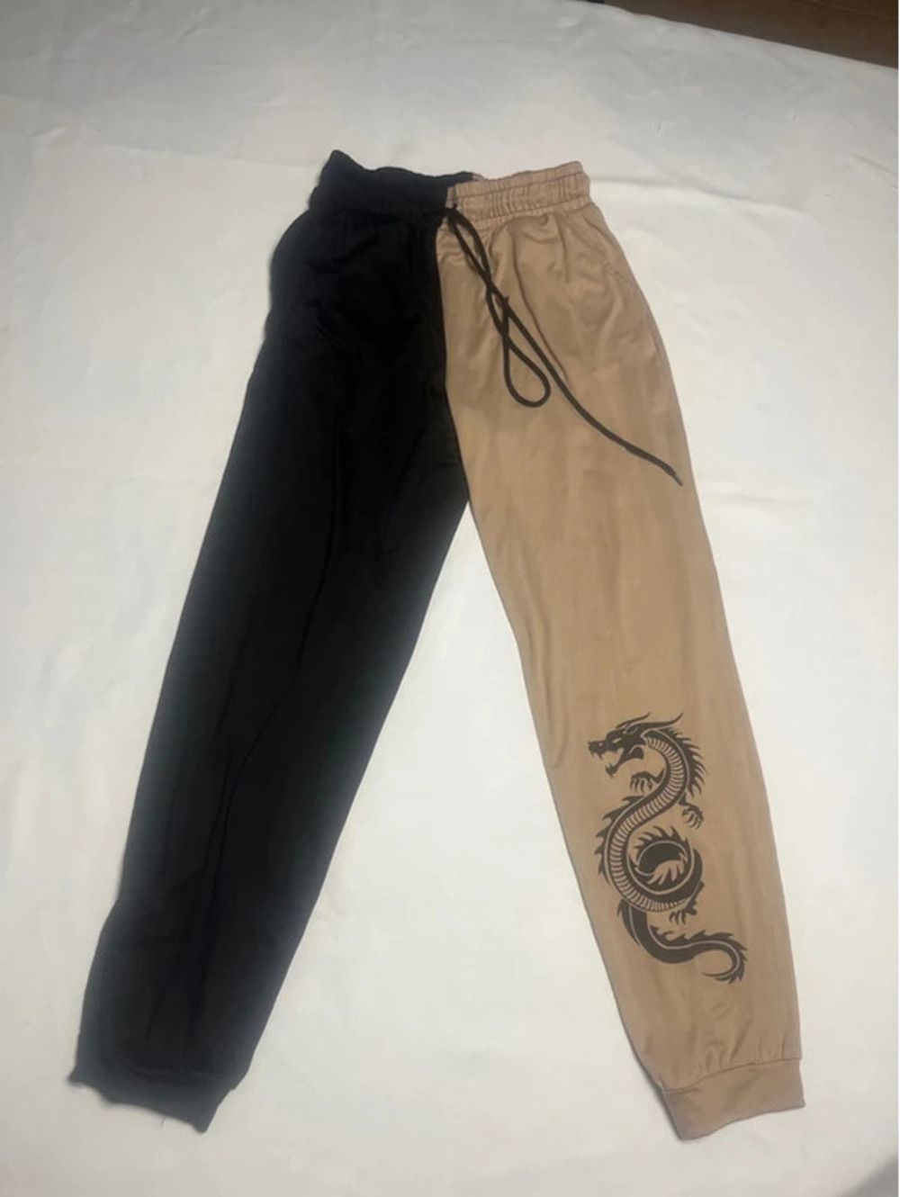 Women’s juniors size, small, comfortable pants, tan, gray dragon elastic bowtie